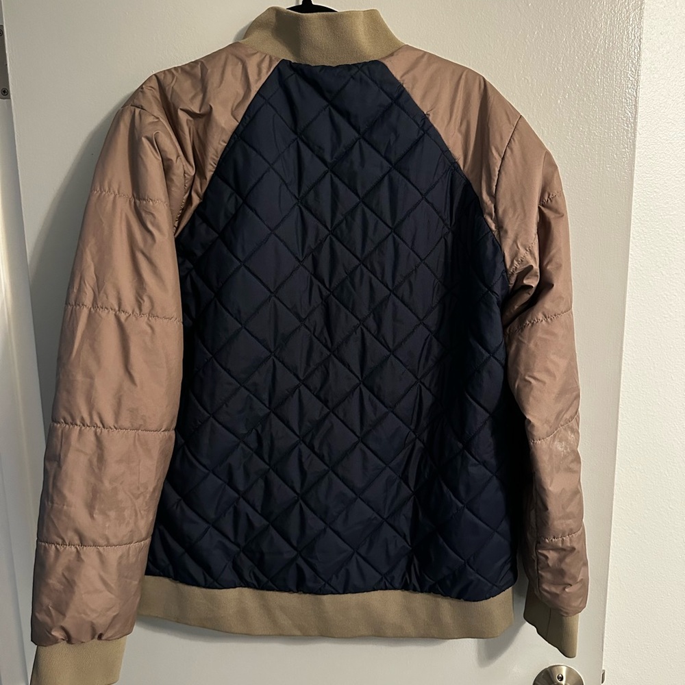 The North Face Quilted Blue and Tan Bomber Jacket